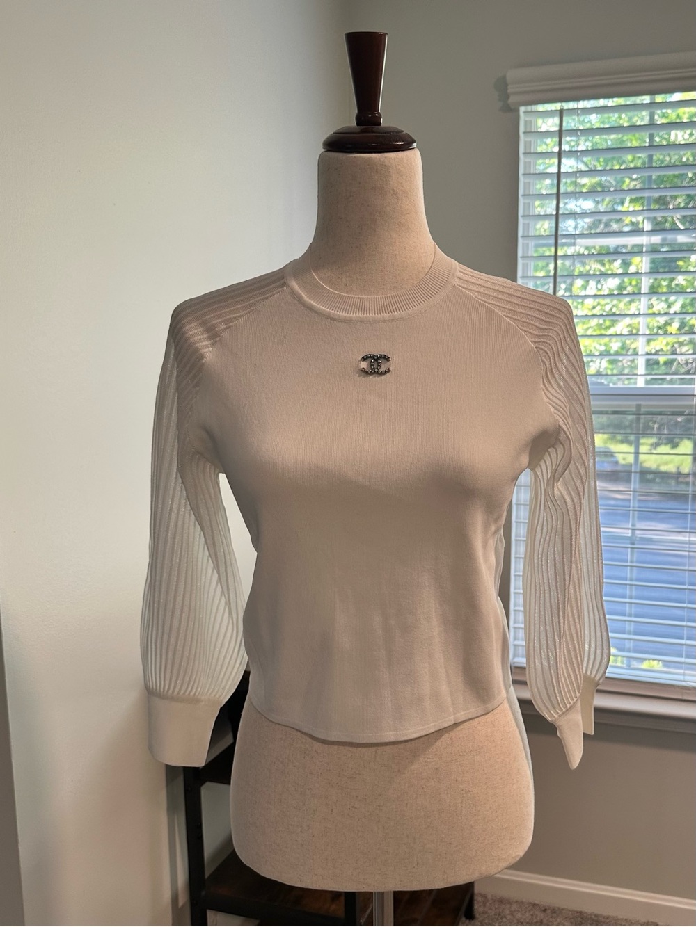 Chanel Women's Long-Sleeve Knit Top with Embellished Logo